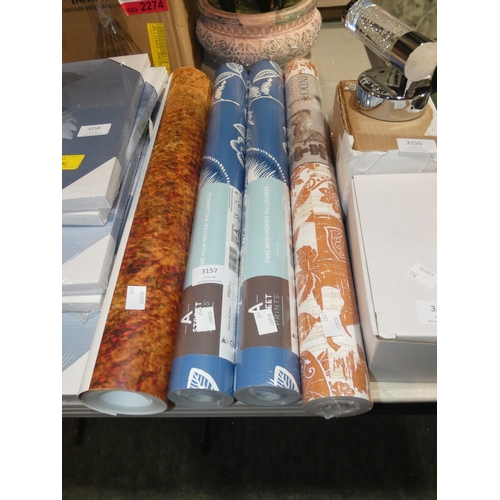 3157 - Four mixed wallpaper rolls * this lot is subject to VAT