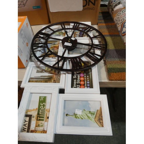 3160 - A metal wall clock (40cm) and a white plastic picture frame * this lot is subject to VAT (picture fr... 