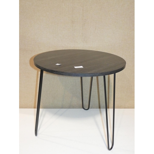 3171 - A black circular side table * this lot is subject to VAT (minor scratches to table top)