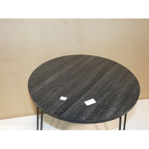 3171 - A black circular side table * this lot is subject to VAT (minor scratches to table top)