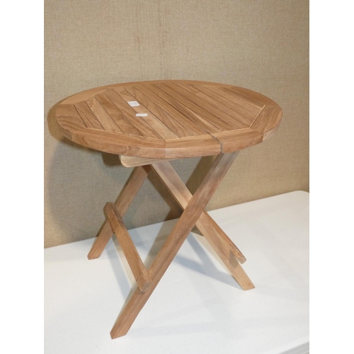 3172 - A teak circular folding side table (H50cm x dia 50cm) * this lot is subject to VAT