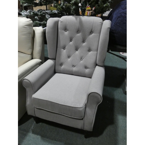 3195 - A grey upholstered armchair (H105 x W78 x D80cm) * this lot is subject to VAT