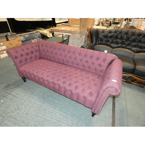 3205 - A purple upholstered Chesterfield style sofa (H74 x W188 x D75cm) * this lot is subject to VAT