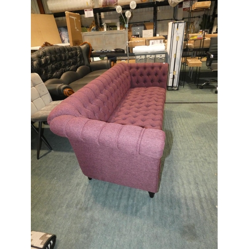 3205 - A purple upholstered Chesterfield style sofa (H74 x W188 x D75cm) * this lot is subject to VAT