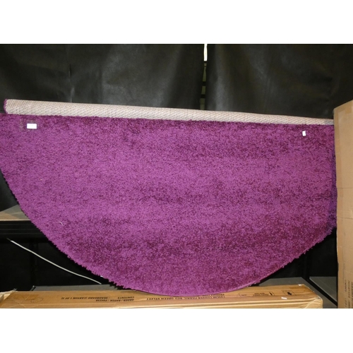 3236 - A purple round shaggy rug (dia 200cm) * this lot is subject to VAT (11 Nov)