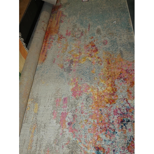 3249 - A multi-coloured patterned rug (275 x 365cm) * this lot is subject to VAT (11 Nov)