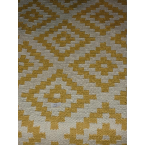 3250 - A Kenitra yellow/white rug (140 x 200cm) * this lot is subject to VAT (11 Nov)