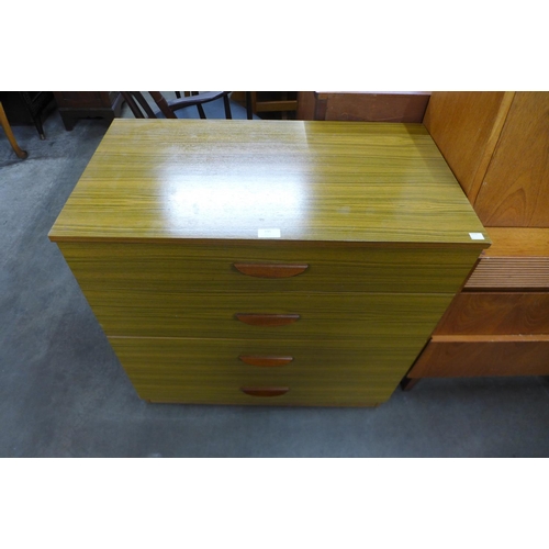 201 - A teak chest of drawers