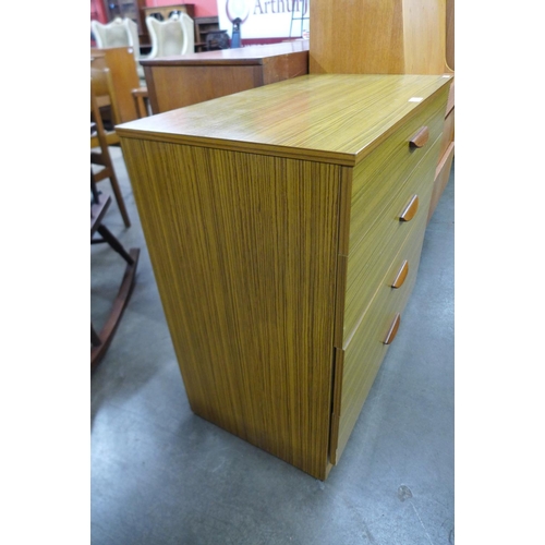 201 - A teak chest of drawers