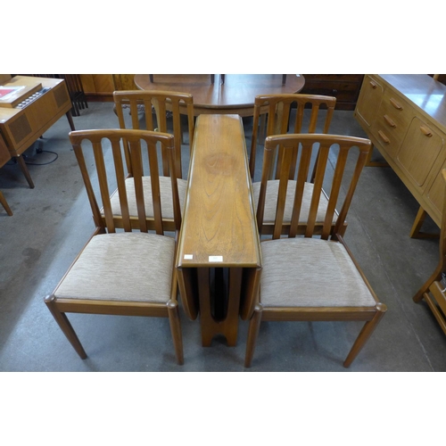 204 - A teak drop-leaf table and four chairs