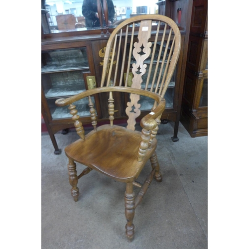 230 - An elm and beech Windsor armchairs