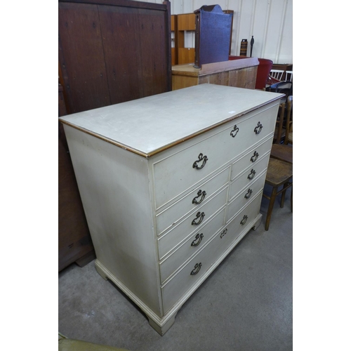 242 - A George III painted oak chest of drawers (top adapted to lift up)