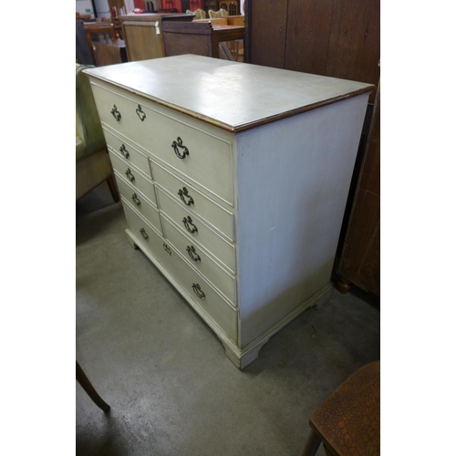 242 - A George III painted oak chest of drawers (top adapted to lift up)