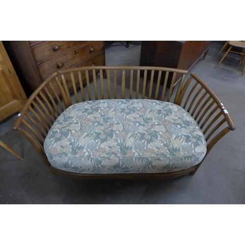 165 - An Ercol Golden Dawn elm settee