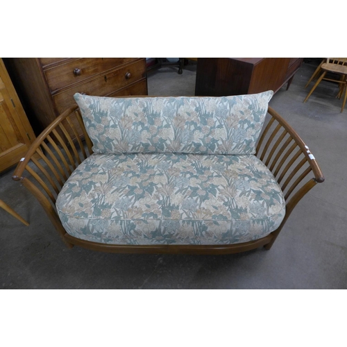 165 - An Ercol Golden Dawn elm settee