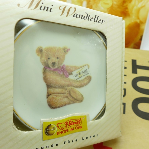 672 - A Steiff 2004 light blue little Teddy bear, boxed, and a Mini Wandteller 125 year commemorative dish... 