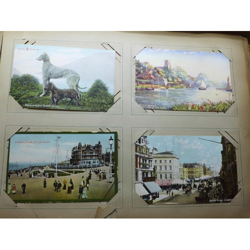 691 - Sixty Edwardian and later postcards in period album