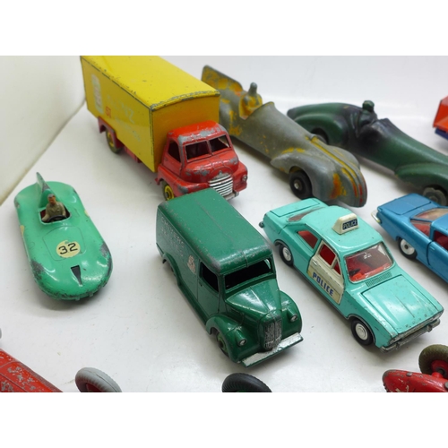 693 - A collection of thirteen Dinky Toys model vehicles including Ford Escort Police Car, Chivers Jellies... 