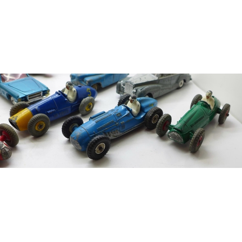 693 - A collection of thirteen Dinky Toys model vehicles including Ford Escort Police Car, Chivers Jellies... 