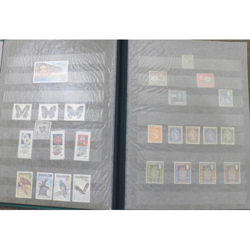 697 - Stamps;- worldwide collection including GB, Montserrat, Nederland, NZ, Pitcairn, Australia, Guinea, ... 