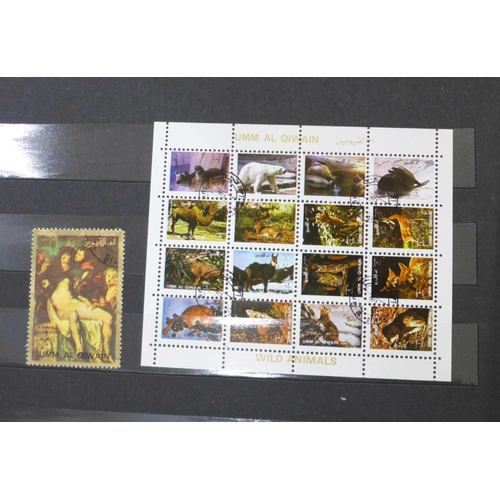 697 - Stamps;- worldwide collection including GB, Montserrat, Nederland, NZ, Pitcairn, Australia, Guinea, ... 