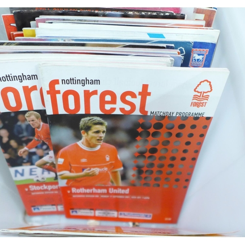 709 - Football; quantity of Nottingham Forest and Notts County home and away programmes together with team... 