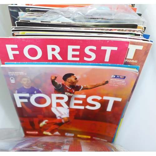 709 - Football; quantity of Nottingham Forest and Notts County home and away programmes together with team... 