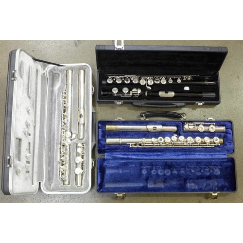 710 - Three cased flutes, Slade USA, Artley and Odyssey