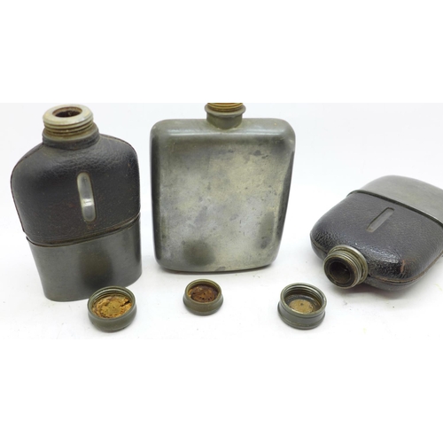 720 - Three hip flasks including one marked James Dixon