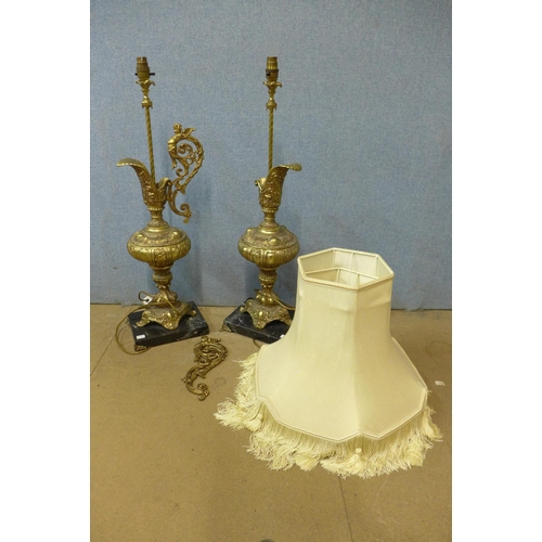 424 - A pair of rococo style brass and marble based table lamps, one a/f