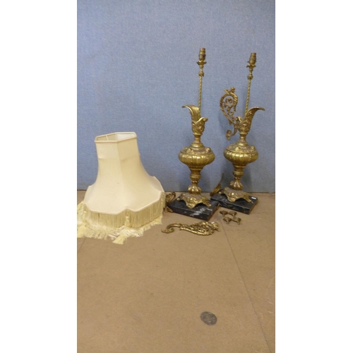 424 - A pair of rococo style brass and marble based table lamps, one a/f