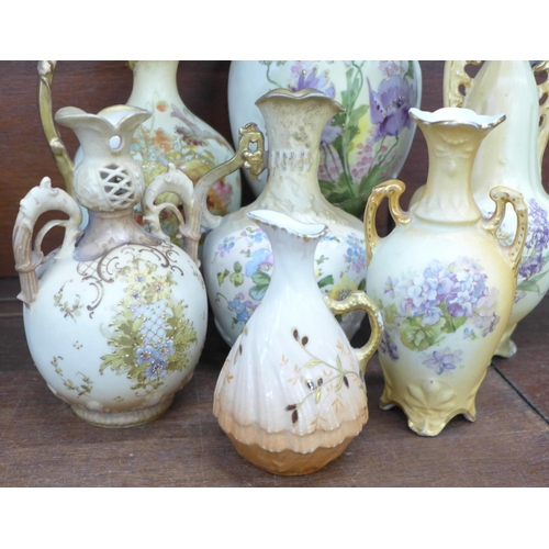 767 - Seven late 19th/early 20th Century blush ivory vases; Austria and others