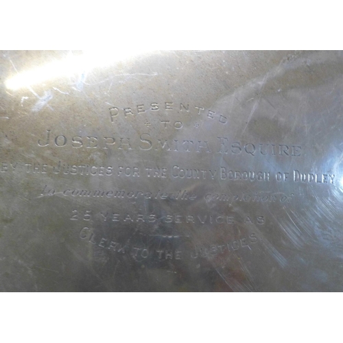 780 - A large silver tray on three feet, with presentation inscription, by Adie Bros., Birmingham 1933, 13... 