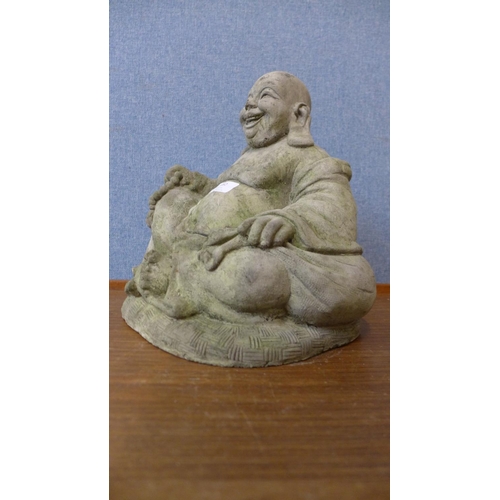 375 - A concrete Buddha garden ornament