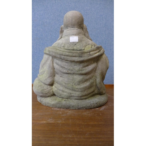 375 - A concrete Buddha garden ornament