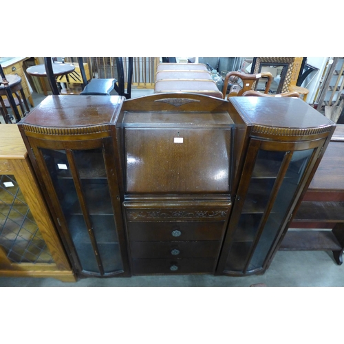 335 - An oak side by side bureau bookcase and a student's bureau