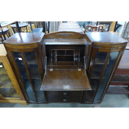 335 - An oak side by side bureau bookcase and a student's bureau