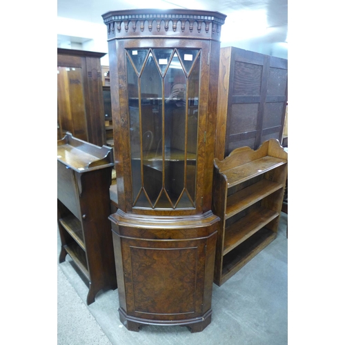 337 - A burr walnut freestanding corner cabinet