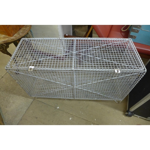 378 - A galvanised wirework storage cage, 70cms h, 122cms w, 46cms d