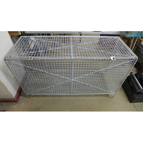 378 - A galvanised wirework storage cage, 70cms h, 122cms w, 46cms d