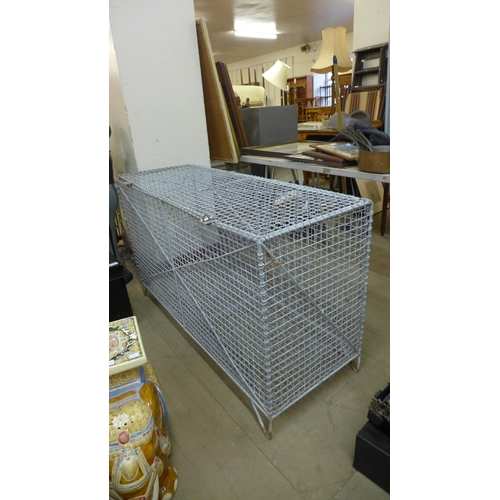 378 - A galvanised wirework storage cage, 70cms h, 122cms w, 46cms d