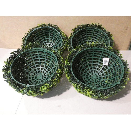 3011 - Four artificial hanging baskets (no fixings) * this lot is subject to VAT