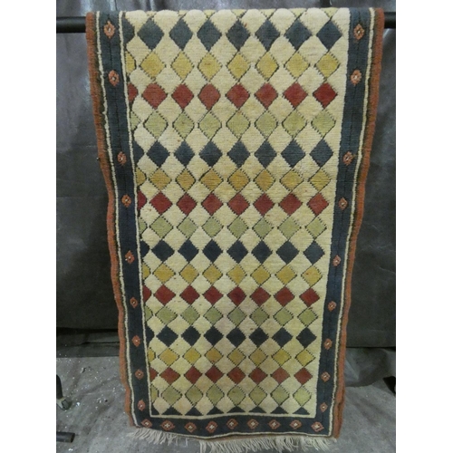 3300 - A Kars patterned rug (273 x 76cm) * this lot is subject to VAT