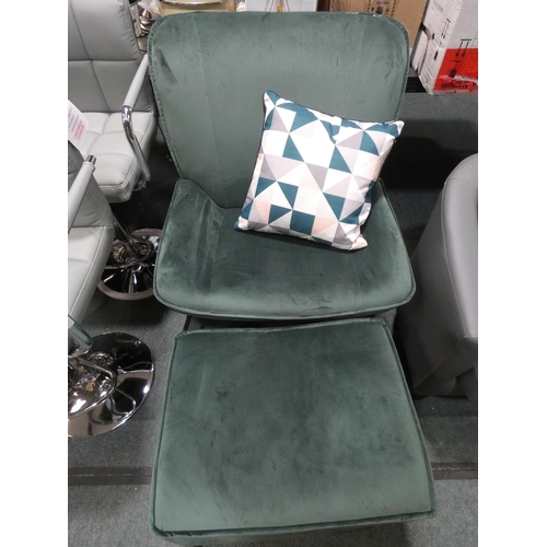 3251 - A green velvet chair and footstool with cushion (H 90 x W 73 x D 75cm) stool (H 41 x W 58 x D 45cm) ... 