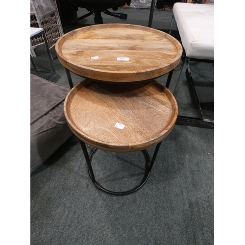 3262 - A wood/metal circular nest of two tables * this lot is subject to VAT