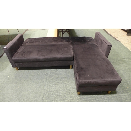 3167 - A black velvet L-shaped sofa with lift up storage (H 80cm x W 215cm x D 153cm) * this lot is subject... 