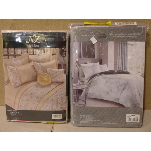 3180 - Two mixed style double duvet sets * this lot is subject to VAT