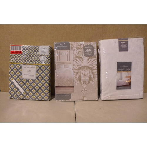 3189 - Three mixed style double duvet sets * this lot is subject to VAT