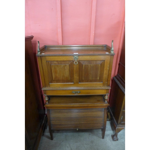 103 - A Victorian Writing Cabinet Patent mahogany tambour front writing cabinet, manner of Jas Schoolbred,... 