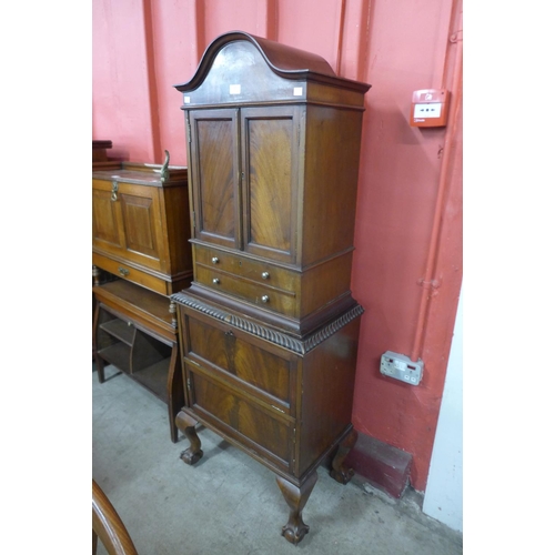 104 - An Edward VII mahogany dome top side cabinet, 150cms h, 59cms w, 37cms d